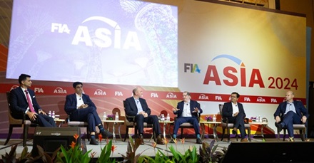 A panel of industry veterans sit on a stage at the FIA Asia conference and explain the current state of India’s derivatives markets to attendees.