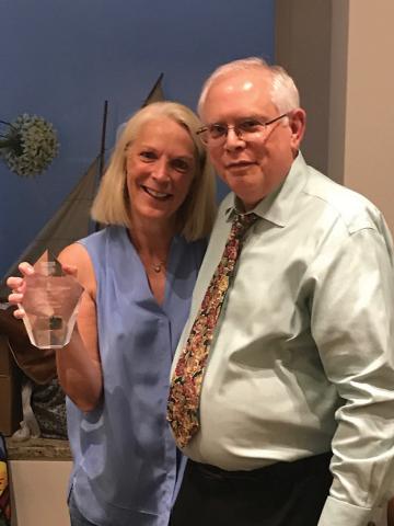 Margie Teller receiving award from Dr. Lou Philipson, director of the Kovler center, for her support of diabetes research.